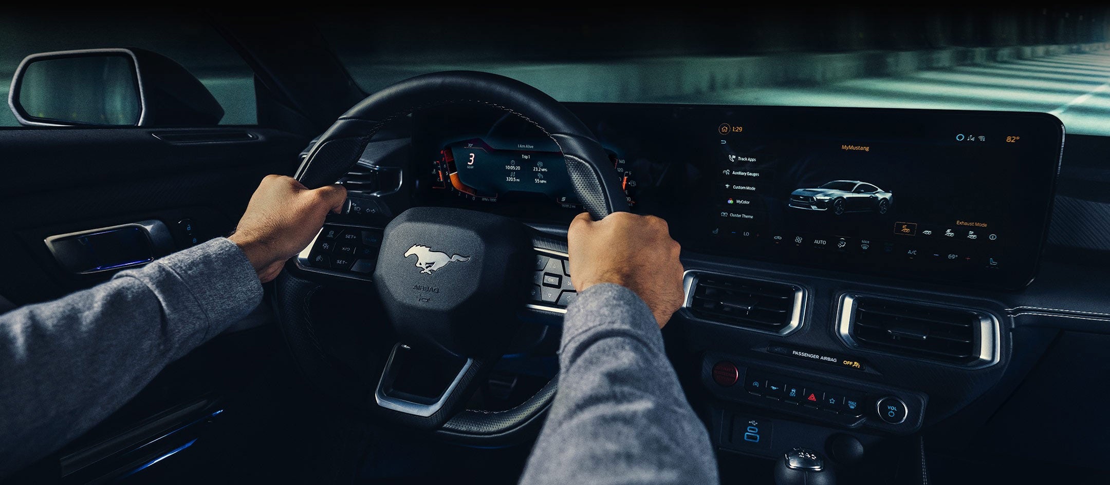 A 2024 Ford Mustang® model interior with a person driving | Pohanka Ford of Salisbury in Salisbury MD
