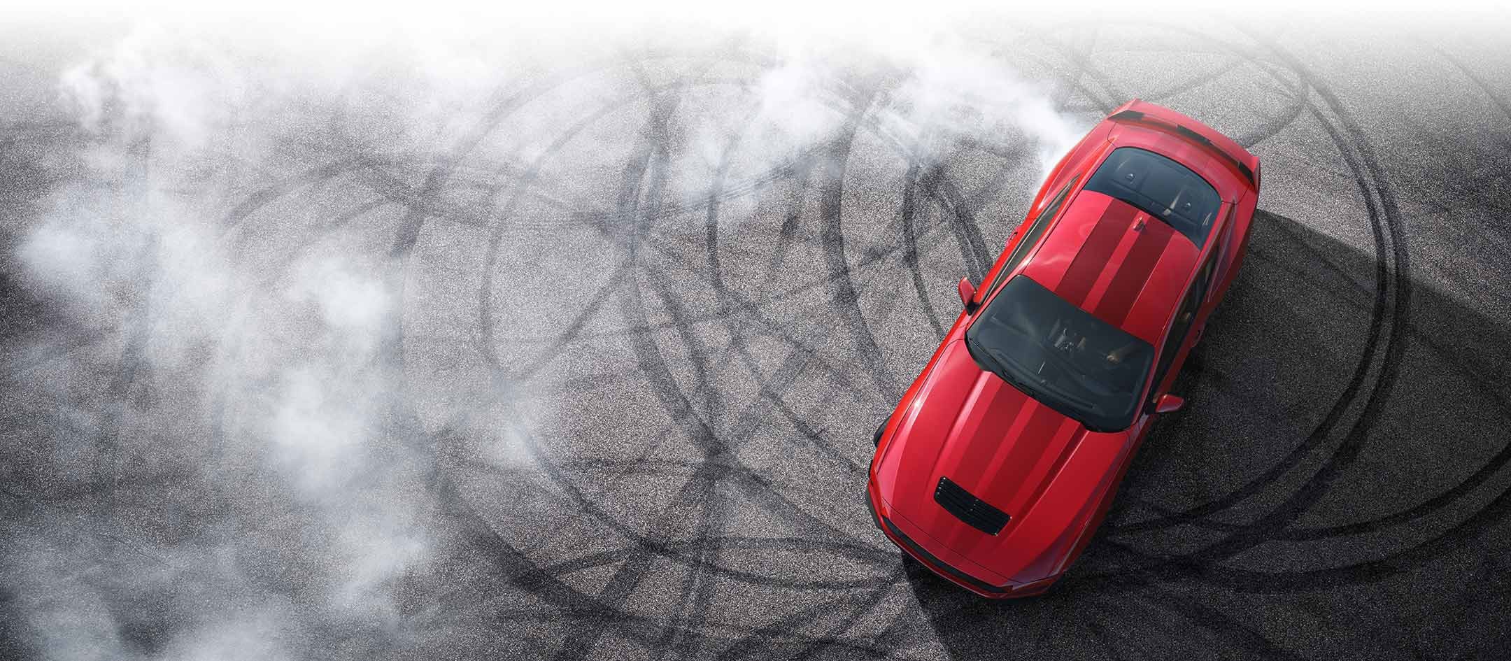 Overhead view of a 2024 Ford Mustang® model with tire tracks on pavement | Pohanka Ford of Salisbury in Salisbury MD