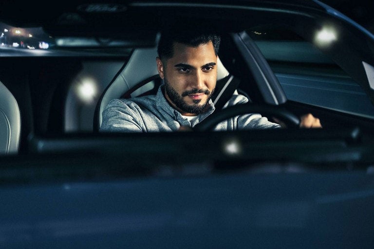 Person sitting in the driver’s seat of a parked 2024 Ford Mustang® coupe | Pohanka Ford of Salisbury in Salisbury MD